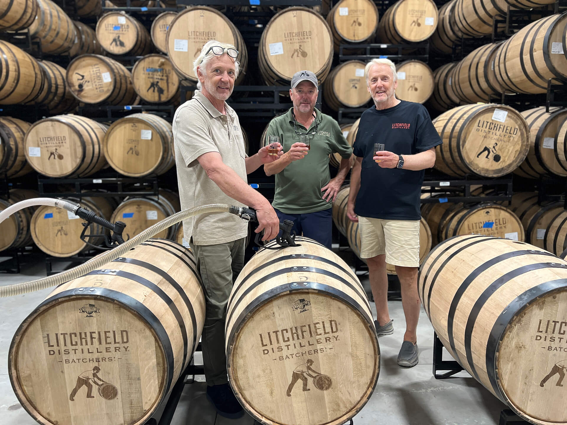 Bakers-toasting-by-barrels-Sized